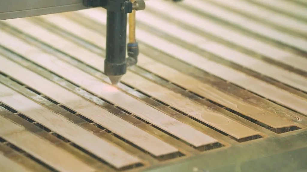 A close up view of a machine cutting wood slices with precision showcasing the process of manufacturing wood products