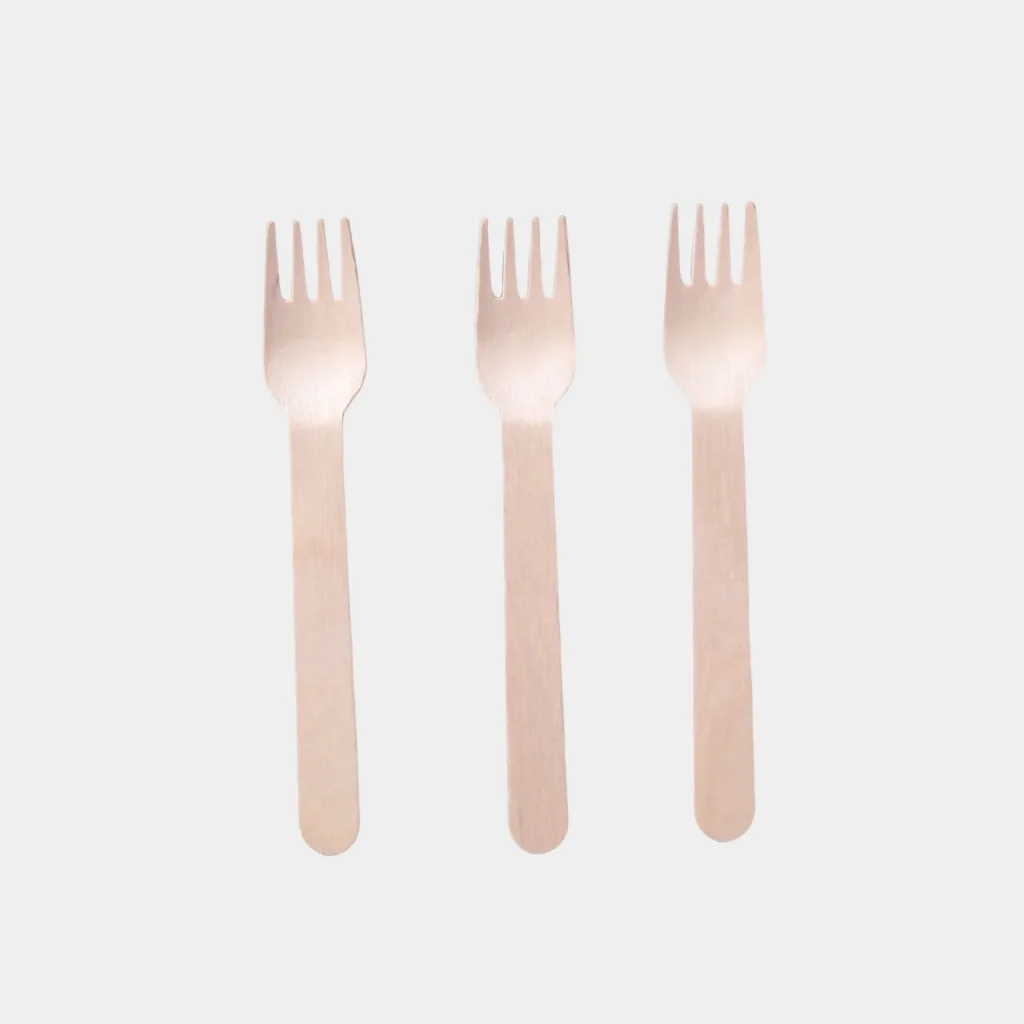 Three wooden forks with rounded handles in a simple design