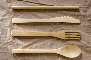 Bamboo straw knife fork and spoon on fabric